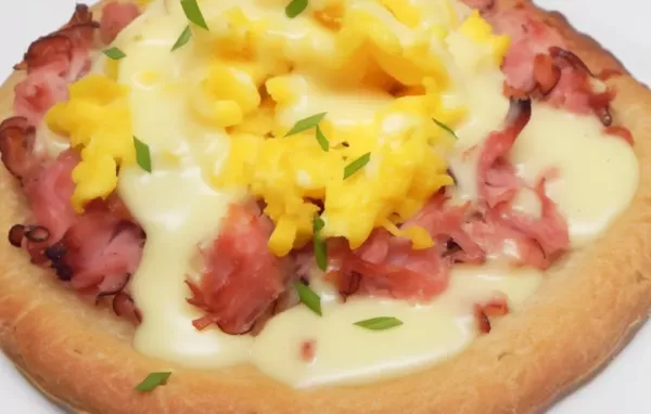 A fusion of classic Eggs Benedict and pizza, this Quick Eggs Benny Pizza is a delightful twist on two beloved dishes.