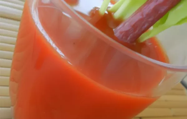 A savory and bold twist on the classic Bloody Mary cocktail, featuring beef broth and steak garnish.