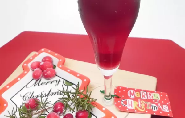 Celebrate the holiday season with this festive Christmas Mimosa recipe!