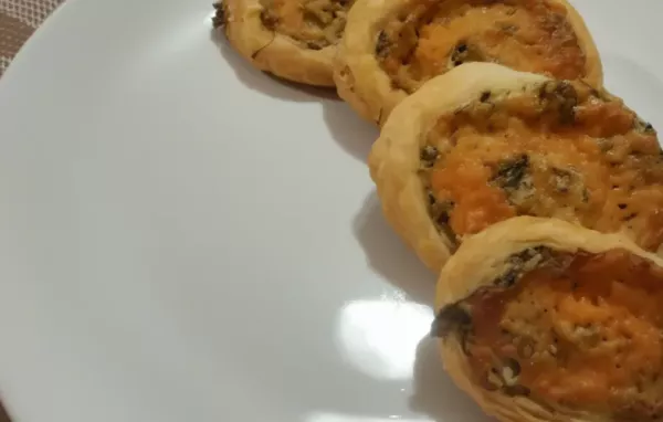 Cheesy and savory, these Cheddar and Spinach Pinwheels are perfect for a party appetizer.