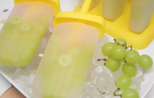 Cool off with these refreshing and fun cotton candy grape lemonade ice pops!