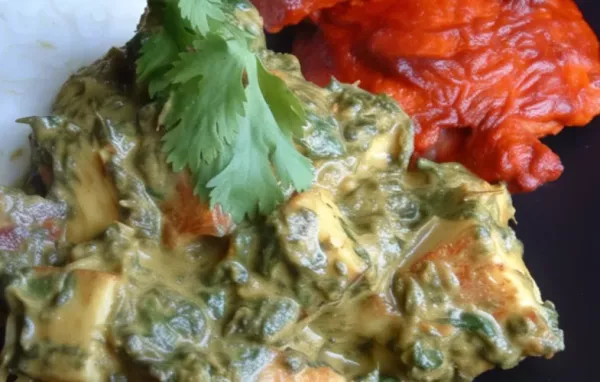 Delicious and creamy palak paneer with tender paneer cubes cooked in a flavorful spinach gravy.