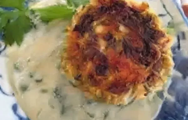 Delicious Asian-inspired salmon cakes with a creamy miso and sake sauce