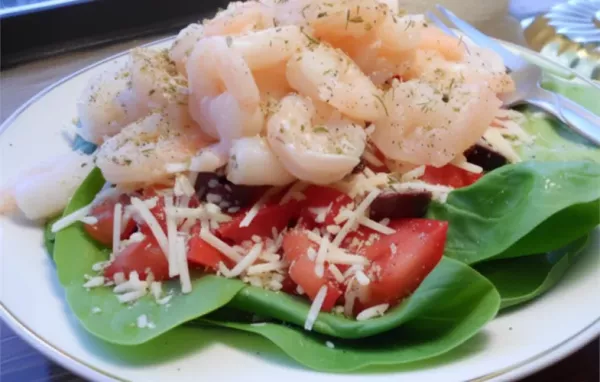 Delicious Greek-inspired shrimp salad with a twist of fresh baby spinach