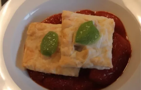 Delicious Homemade Sausage and Ricotta Ravioli with Fresh Pesto Sauce