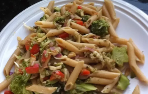 Delicious Penne Pasta with a Flavorful Red Pepper Sauce and Nutritious Broccoli