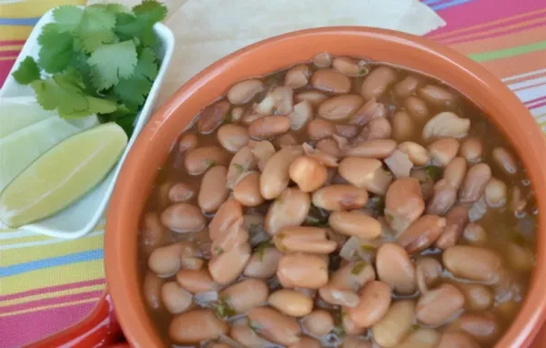 Flavorful and hearty Instant Pot charro refried beans recipe