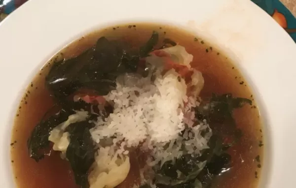Garlicky Tortellini Soup with Sausage, Tomatoes, and Spinach