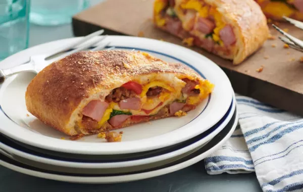 Ham and Sausage Breakfast Stromboli with Roasted Peppers and Spinach