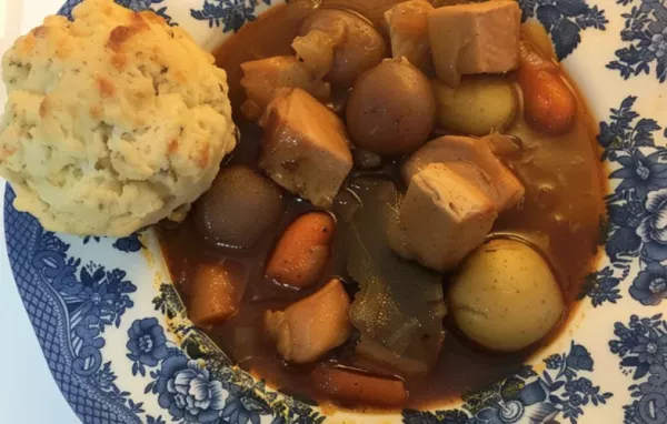 Hearty and comforting pork rib stew with savory sage cornmeal dumplings