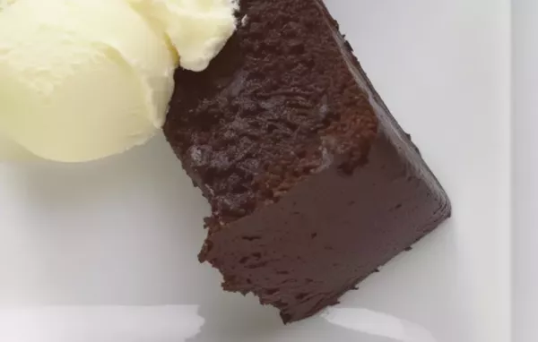 Indulge in a decadent treat with this Slow Cooker Chocolate Cake recipe.