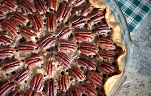 Indulge in the rich and decadent flavors of chocolate, bourbon, and pecans with this irresistibly delicious pie.