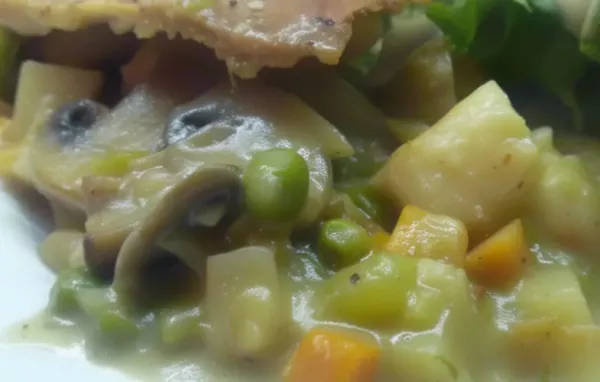 Indulge in the savory flavors of Lew's Famous Lobster Pot Pie