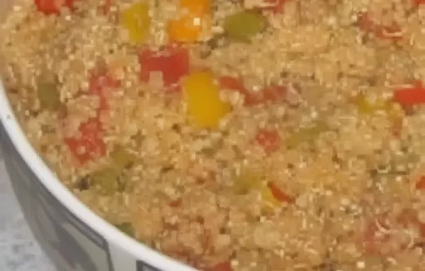 Light and refreshing Mediterranean quinoa salad with a mix of colorful vegetables, herbs, and tangy feta cheese.