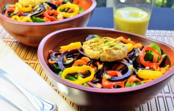 Roasted Sweet Potato and Beet Noodle Salad with Goat Cheese Medallions and Pistachios