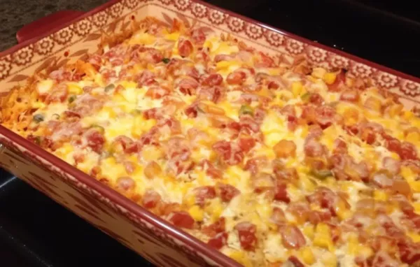 Satisfy your comfort food cravings with this delicious Cheesy Chicken Dorito Casserole!