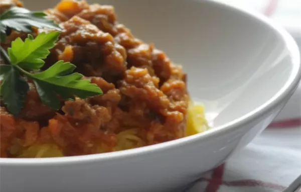 Satisfy your pasta cravings with this healthy twist on spaghetti squash with paleo meat sauce.