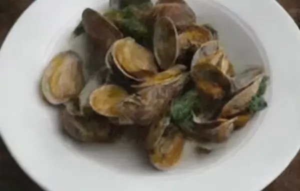 Spicy and Flavorful Clams with Chili Paste and Basil