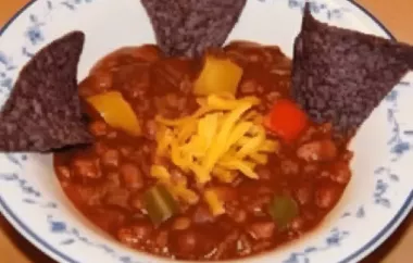 A hearty and flavorful vegetarian chili with the addition of pumpkin for a unique twist.