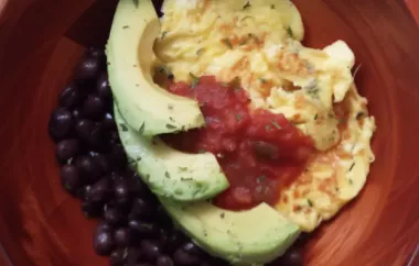A hearty and nutritious breakfast bowl featuring black beans, avocado, eggs, and salsa.