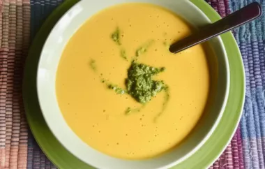 Creamy and flavorful vegan sweet potato soup topped with a vibrant kale pesto.