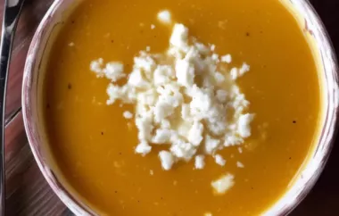 Creamy and savory pumpkin and pear bisque topped with tangy goat cheese
