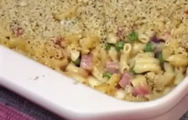 Creamy macaroni and cheese combined with savory ham, sweet peas, and caramelized shallots.