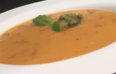 Creamy tomato soup infused with the flavors of basil pesto