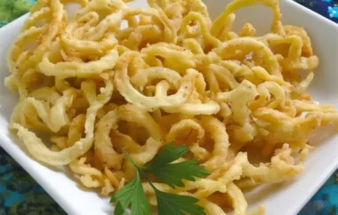 Crispy and delicious deep-fried zucchini spirals perfect for a tasty appetizer or snack.