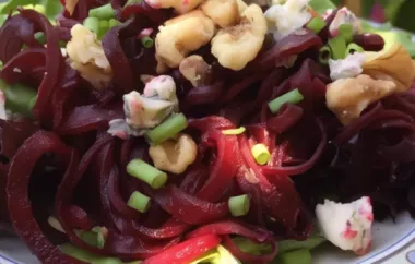 Delicious and colorful Spiralized Roasted Beet Salad with a unique Quince Vinaigrette dressing.