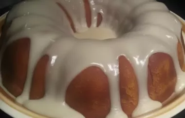 Delicious and moist holiday pumpkin cake with a rich rum cream cheese glaze