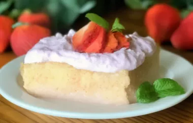 Delicious and Moist Strawberries and Cream Baileys Poke Cake Recipe