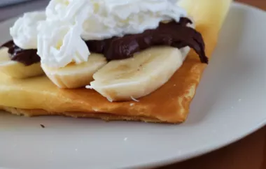 Delicious Nutella Banana and Whipped Cream Filled Crepes Recipe