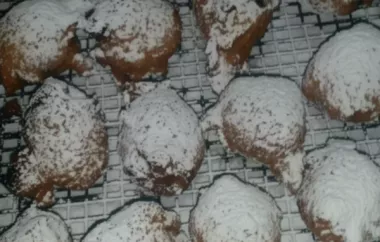 Delicious Oliebollen with Raisins and Freshly Fried in a Pan