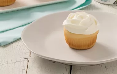 Deliciously Classic Vanilla Cupcakes with Fluffy Vanilla Whipped Cream Frosting