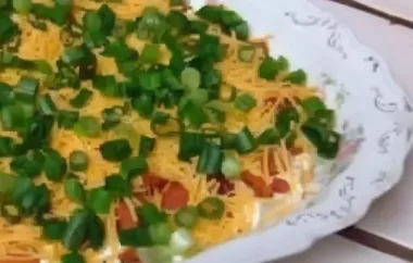Indulge in a creamy and flavorful loaded baked potato dip