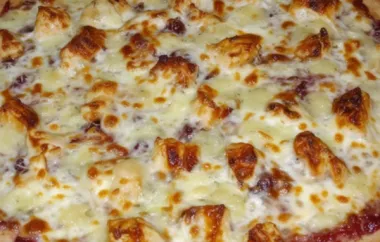 Indulge in a delicious combination of flavors with this Brie, Cranberry, and Chicken Pizza recipe.