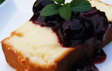 Indulge in a heavenly treat with this Sour Cream Lemon Pound Cake topped with a luscious Cherry Compote.
