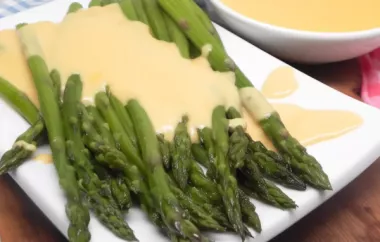 Indulge in the rich flavors of roasted asparagus with a smoky gouda cheese sauce.