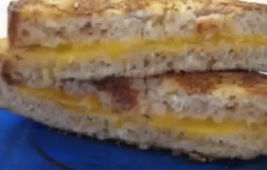 Indulge in the ultimate cheesy goodness with this Death by Cheese Sandwich recipe