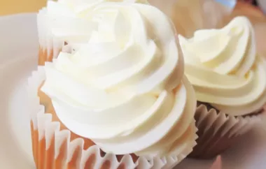 Indulge in these decadent banana chocolate chip cupcakes topped with creamy cream cheese frosting for the perfect sweet treat.