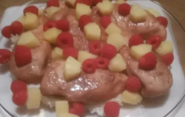 Juicy chicken breasts coated in a sweet and tangy raspberry glaze