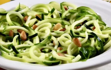 Refreshing and healthy zucchini noodle salad tossed in a tangy lemon garlic vinaigrette.