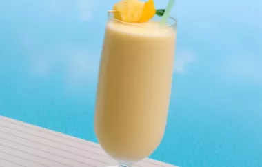 Refreshing and tropical, this Mango Piña Colada Smoothie is the perfect drink for hot summer days.