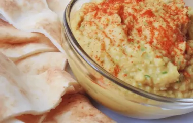 Spice up your next party with this delicious Artichoke Jalapeno Hummus Dip!