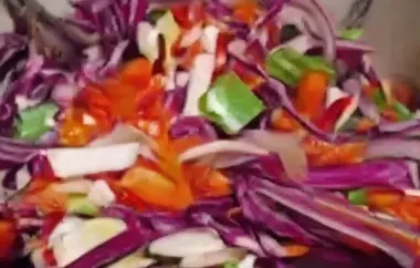 Spicy and vibrant red salad with a mix of fresh vegetables and zesty flavors