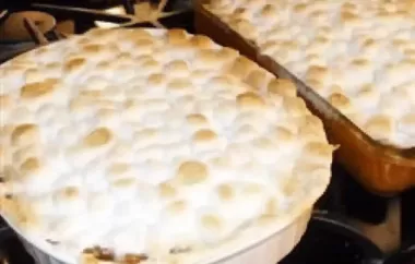 Sweet and gooey Candied Yams topped with golden marshmallows