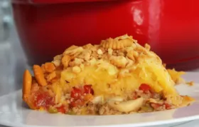 A delicious and hearty casserole dish made with spaghetti squash and seasoned ground beef, perfect for a cozy family dinner.