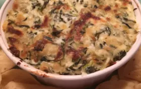 Creamy and cheesy artichoke dip with a spinach twist