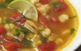 Delicious and comforting Chicken and Hominy Soup with a zesty twist of lime and fragrant cilantro